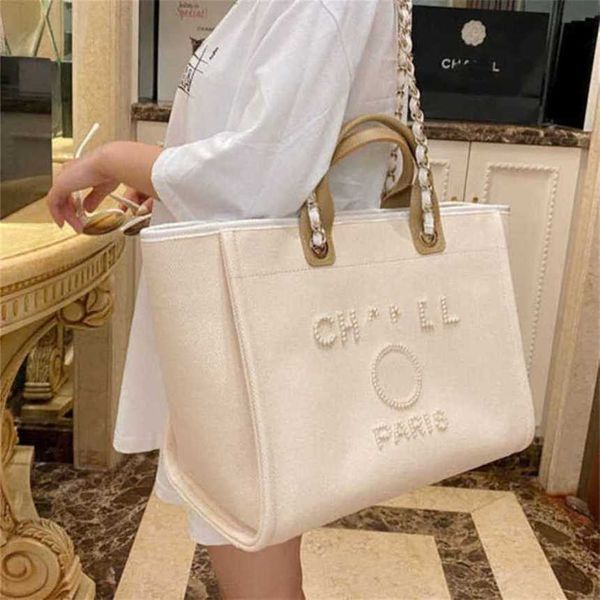 50% off women's luxury classic canvas beach bag large capacity small chain packs big shopping handbags artn 
50% off women's luxury classic canvas beach bag large capacity small chain packs big shopping handbags artn
