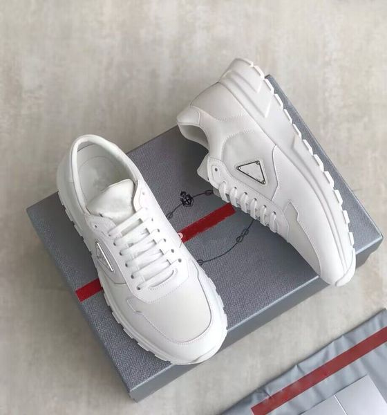 prax 01 men brushed leather sneaker shoes white black man technical rubber re-nylon runner trainers brand casual walking original box eu38-4
prax 01 men brushed leather sneaker shoes white black man technical rubber re-nylon runner trainers brand casual walking original box eu38-4