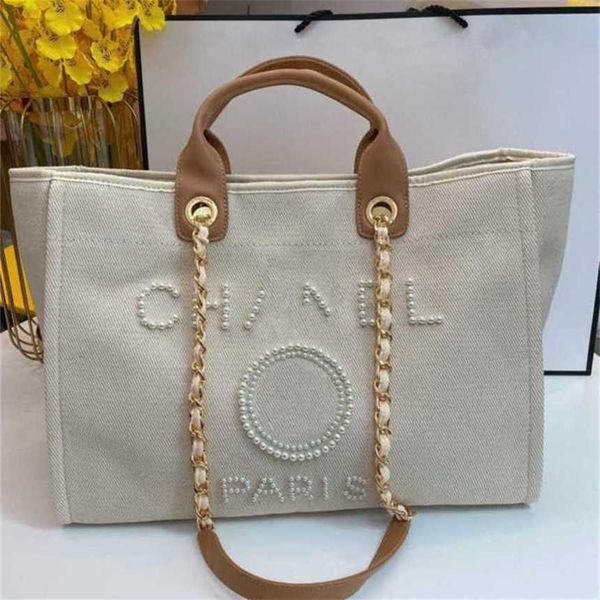 50% off luxury women's beach classic canvas large capacity bag small chain packs big shopping handbags afui
50% off luxury women's beach classic canvas large capacity bag small chain packs big shopping handbags afui