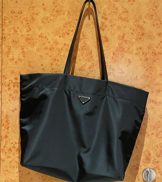 designer bag for women shopping bags re nylon material creative big size with triangle iconic letters decor leather handle totes bag modern
designer bag for women shopping bags re nylon material creative big size with triangle iconic letters decor leather handle totes bag modern