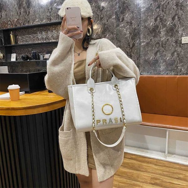 60% off luxury handbags women's metal badge tote bag small beach female capacity large leather one shoulder backpack p0gy 
60% off luxury handbags women's metal badge tote bag small beach female capacity large leather one shoulder backpack p0gy