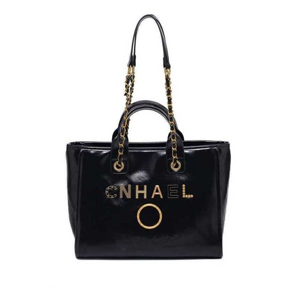 50% off luxury classic women's handbags beach metal badge tote bag designer small capacity large leather one shoulder 161p
50% off luxury classic women's handbags beach metal badge tote bag designer small capacity large leather one shoulder 161p