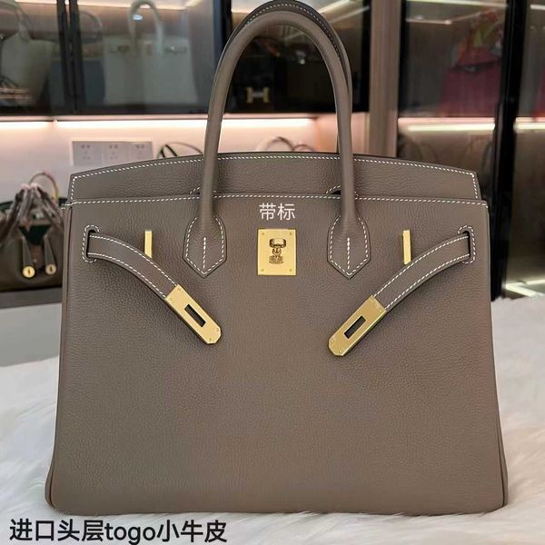 fashion bags herms binkins high order home bk bag 25/30cm calf leather lychee pattern genuine leather buckle portable women's bag
fashion bags herms binkins high order home bk bag 25/30cm calf leather lychee pattern genuine leather buckle portable women's bag