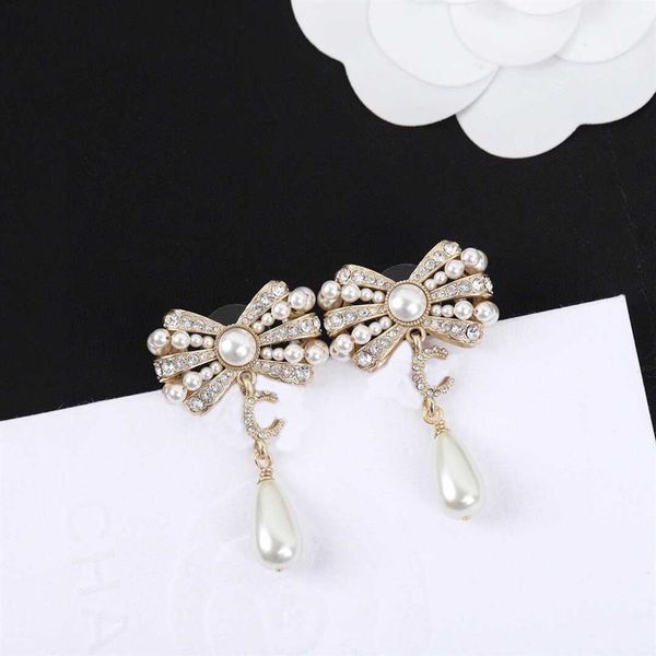 2022 charm drop earring with diamond and nature shell beads knot shape for women wedding jewelry gift have box ps7800229j, Golden
2022 charm drop earring with diamond and nature shell beads knot shape for women wedding jewelry gift have box ps7800229j, Golden