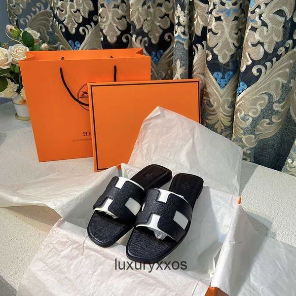 designer 2023 slide women's leather beach slippers flats high h shoe outwear sandal orans flat bottom beach sandals vkap
designer 2023 slide women's leather beach slippers flats high h shoe outwear sandal orans flat bottom beach sandals vkap