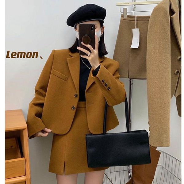 dress autumn and winter new women's woolen twopiece fashion korean style short longsleeved suit jacket + highwaist split skirt suit, White
dress autumn and winter new women's woolen twopiece fashion korean style short longsleeved suit jacket + highwaist split skirt suit, White