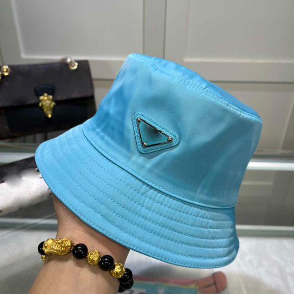 2023 designer men women bucket hat close-fitting hat sun protection hat metal triangle logo outdoor fishing dress bucket hat, Blue;gray
2023 designer men women bucket hat close-fitting hat sun protection hat metal triangle logo outdoor fishing dress bucket hat, Blue;gray