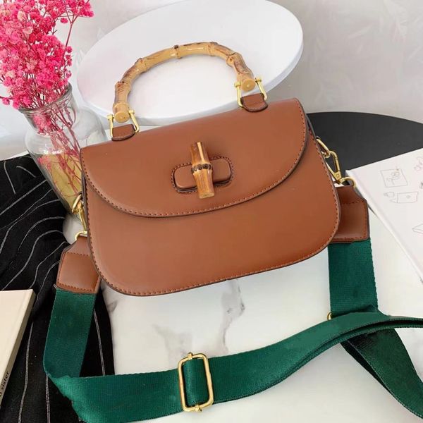 fashion designer saddles bag women's tote handbag purse luxury design portable hard bamboo slut bag senior large strap single shoulder
fashion designer saddles bag women's tote handbag purse luxury design portable hard bamboo slut bag senior large strap single shoulder