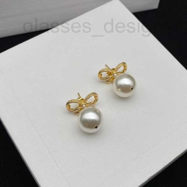 charm designer new bowknot pearl earrings, female celi fashion high sense ins silver needle, gold-plated earrings 14cl, Golden
charm designer new bowknot pearl earrings, female celi fashion high sense ins silver needle, gold-plated earrings 14cl, Golden