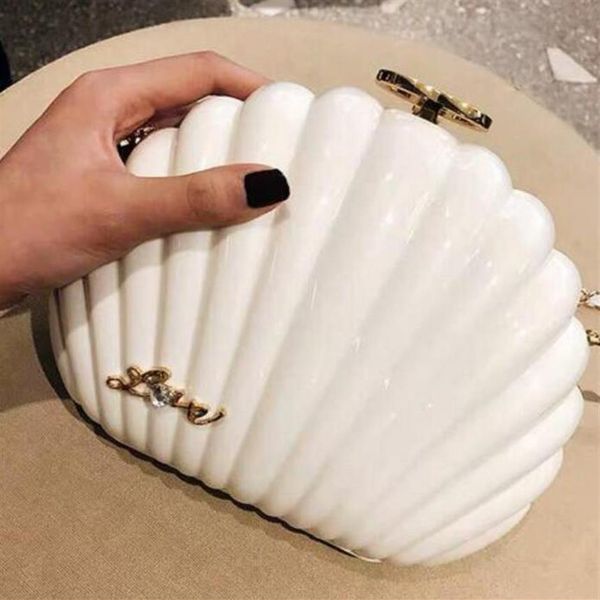 elegant ivory pearl shell wristband bag brand clutch wallet designer chain shoulder bag luxury vip gift purse black pearl she247n
elegant ivory pearl shell wristband bag brand clutch wallet designer chain shoulder bag luxury vip gift purse black pearl she247n