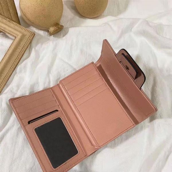 the new 2021 female korean short letters zero wallet brand purse zipper card bag wallets genuine leather purses for women308z, Red;black
the new 2021 female korean short letters zero wallet brand purse zipper card bag wallets genuine leather purses for women308z, Red;black