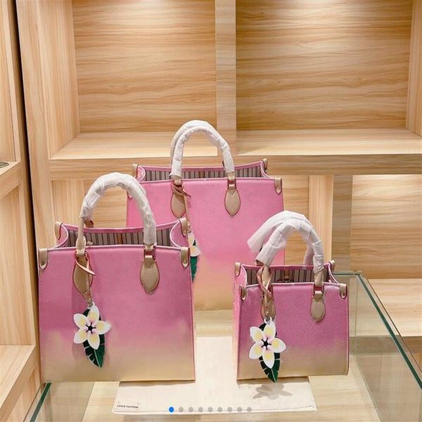 women luxurys designers handbags m45320 ladies tote shopping bags whole handbag fashion onthego classic letter purse 36 41cm o268z
women luxurys designers handbags m45320 ladies tote shopping bags whole handbag fashion onthego classic letter purse 36 41cm o268z