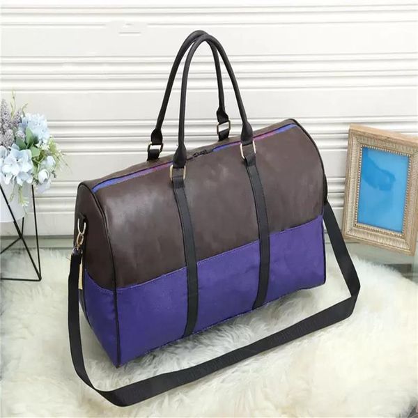 yq luxury fashion men women travel bag duffle bags brand designer pu leather luggage handbags large capacity sport bag2553
yq luxury fashion men women travel bag duffle bags brand designer pu leather luggage handbags large capacity sport bag2553
