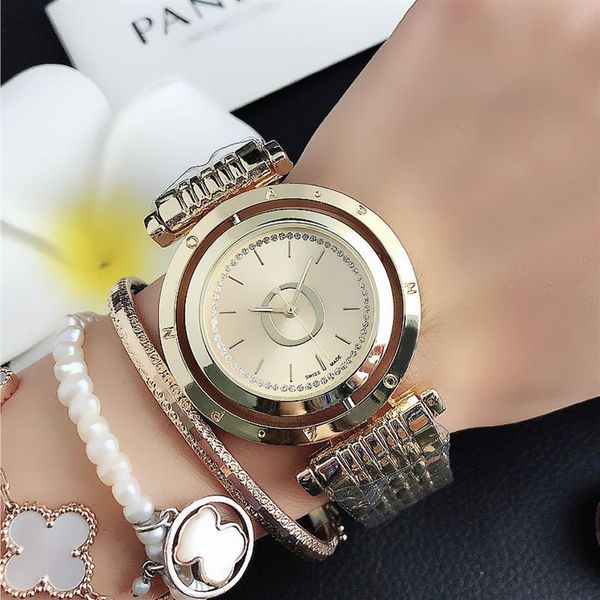 fashion brand watches women's girls crystal rotating dial style metal steel band quartz wrist watch p67195b, Slivery;brown
fashion brand watches women's girls crystal rotating dial style metal steel band quartz wrist watch p67195b, Slivery;brown