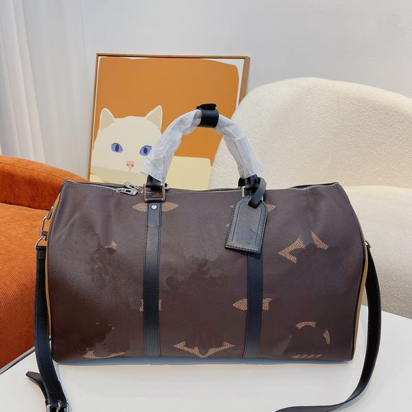 2023 duffel bags luxury fashion men women travel duffle bags brand designer luggage handbags with lock large capacity sport bag size 55cm
2023 duffel bags luxury fashion men women travel duffle bags brand designer luggage handbags with lock large capacity sport bag size 55cm