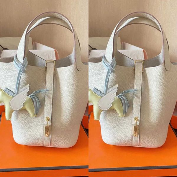 designer luxury bag color matching vegetable basket leather bucket lychee grain layer cowhide simple and versatile portable women's bag
designer luxury bag color matching vegetable basket leather bucket lychee grain layer cowhide simple and versatile portable women's bag