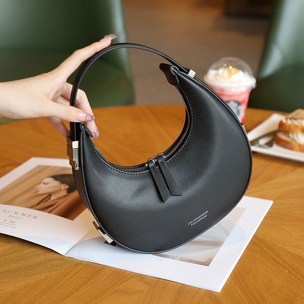 2023 new designer female crescent bag underarm bag half circle moon bag one shoulder portable leather female bag
2023 new designer female crescent bag underarm bag half circle moon bag one shoulder portable leather female bag