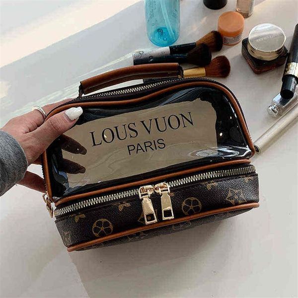 double layer transparent wash bag women's portable large capacity waterproof cosmetic bag new dry and wet portable storage ba252l
double layer transparent wash bag women's portable large capacity waterproof cosmetic bag new dry and wet portable storage ba252l