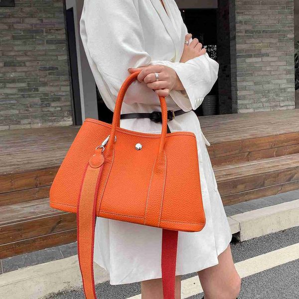designer herbag garden party evening women's 2023 new layer cowhide garden single shoulder messenger large capacity portable tote bag 0
designer herbag garden party evening women's 2023 new layer cowhide garden single shoulder messenger large capacity portable tote bag 0