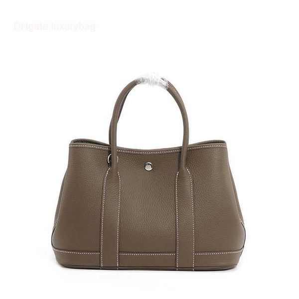 designer herbag garden party evening autumn and winter shopping lychee grain layer cowhide women's garden leather vegetable basket hand
designer herbag garden party evening autumn and winter shopping lychee grain layer cowhide women's garden leather vegetable basket hand