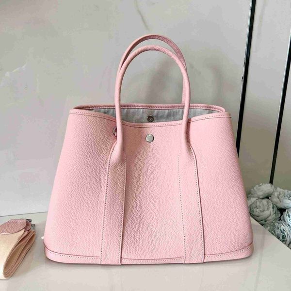 designer herbag garden party evening lychee grain layer cow leather single shoulder messenger with large capacity portable versatile women&#
designer herbag garden party evening lychee grain layer cow leather single shoulder messenger with large capacity portable versatile women&#