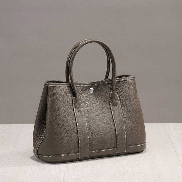 designer herbag garden party evening korean version of simple 2023 lychee head layer cow portable casual leather shoulder for women garden b
designer herbag garden party evening korean version of simple 2023 lychee head layer cow portable casual leather shoulder for women garden b