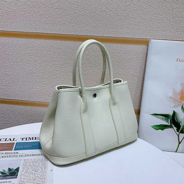 designer herbag garden party evening garden new layer cowhide fashion versatile one-shoulder hand tote bridal large computer female bag kk9c
designer herbag garden party evening garden new layer cowhide fashion versatile one-shoulder hand tote bridal large computer female bag kk9c
