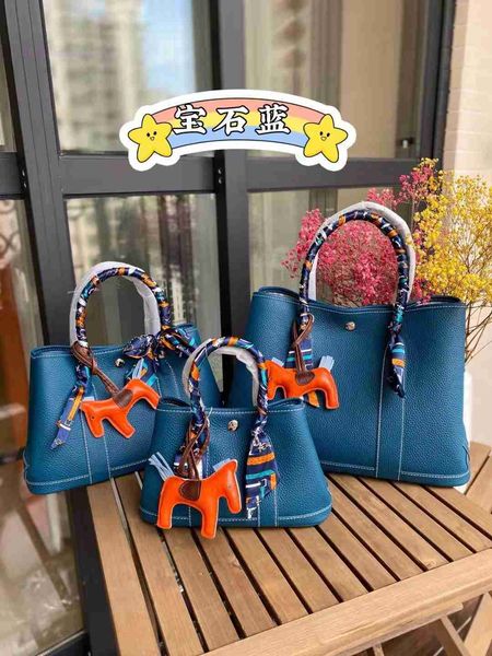 designer herbag garden party evening lichee grain layer cow garden 2023 large capacity mommy fashion leather women's handbag 4ttj
designer herbag garden party evening lichee grain layer cow garden 2023 large capacity mommy fashion leather women's handbag 4ttj