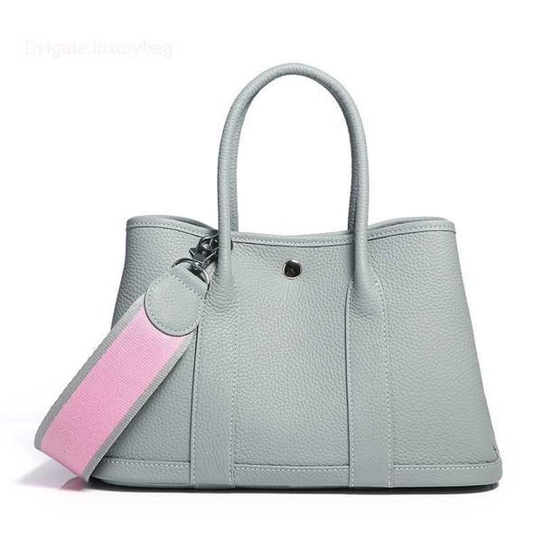 designer herbag garden party evening garden baotou cowhide lizhi pattern women's bag casual one color contrast wide shoulder belt handb
designer herbag garden party evening garden baotou cowhide lizhi pattern women's bag casual one color contrast wide shoulder belt handb