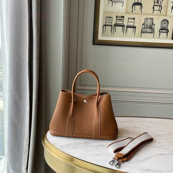 designer herbag garden party evening new garden fashion first layer cowhide versatile large capacity women's hand pure leather tote bag
designer herbag garden party evening new garden fashion first layer cowhide versatile large capacity women's hand pure leather tote bag