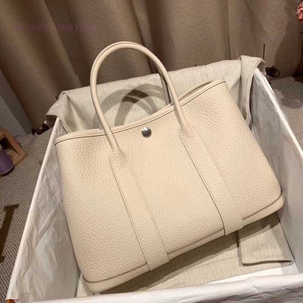 designer herbag garden party evening texture soft leather large capacity portable bucket one shoulder crossbody tote commuter women's b
designer herbag garden party evening texture soft leather large capacity portable bucket one shoulder crossbody tote commuter women's b