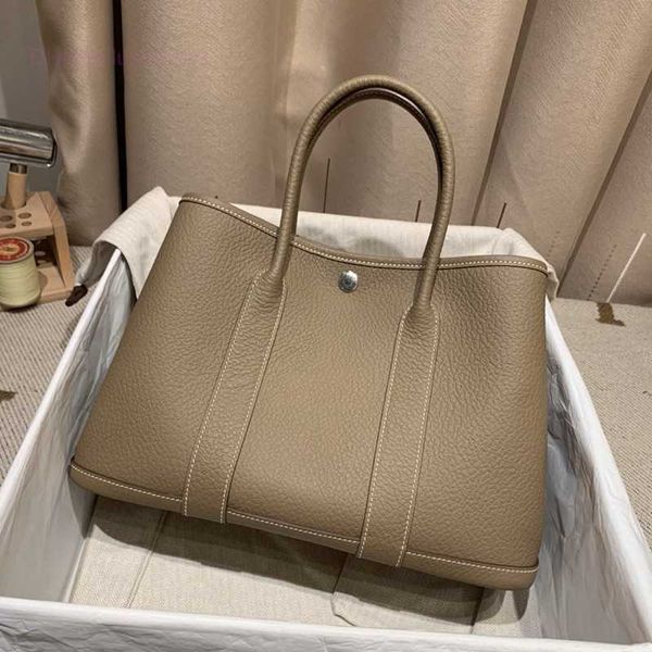designer herbag garden party evening new leather women's litchi pattern handmade wax thread single shoulder messenger tote large capaci
designer herbag garden party evening new leather women's litchi pattern handmade wax thread single shoulder messenger tote large capaci