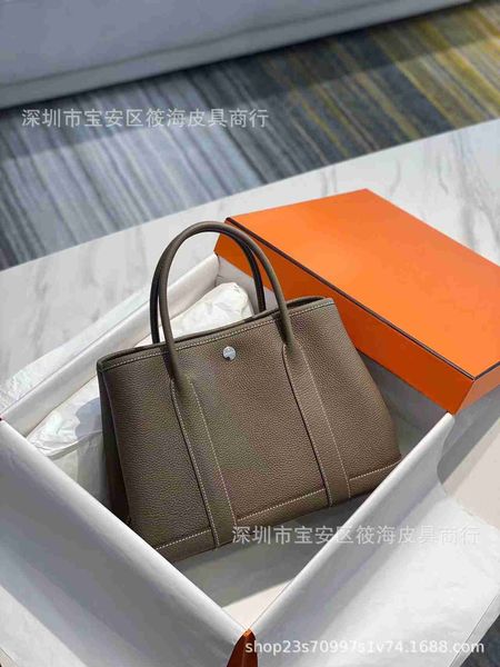 designer herbag garden party evening h family 2023 new garden premium feel hand sewn honey wax thread cowhide portable women's bag srrj
designer herbag garden party evening h family 2023 new garden premium feel hand sewn honey wax thread cowhide portable women's bag srrj