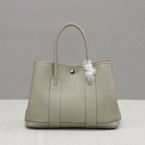 designer herbag garden party evening autumn and winter shopping lychee grain layer cowhide women's garden leather vegetable basket hand
designer herbag garden party evening autumn and winter shopping lychee grain layer cowhide women's garden leather vegetable basket hand
