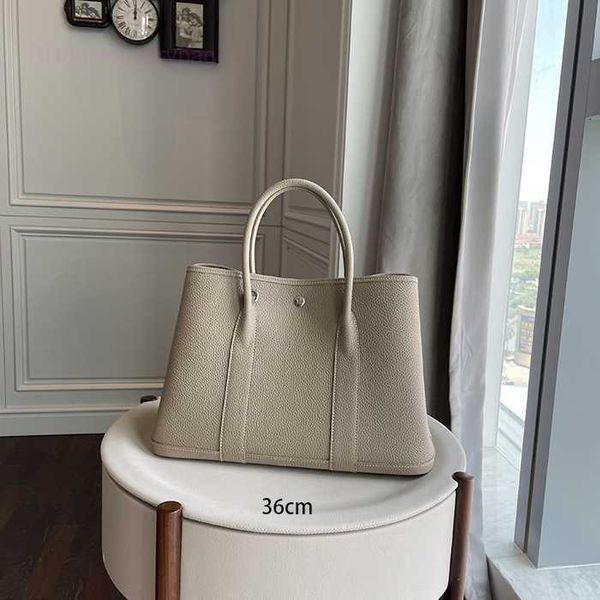 designer herbag garden party evening new garden fashion first layer cowhide versatile large capacity women's hand pure leather tote bag
designer herbag garden party evening new garden fashion first layer cowhide versatile large capacity women's hand pure leather tote bag