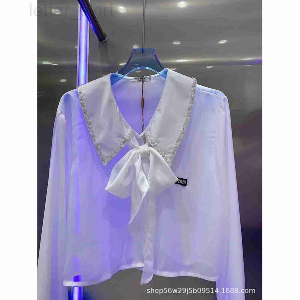 women's polos designer 23 early spring new black label pearl diamond decoration small polo collar long sleeve silk short shirt fashion, White
women's polos designer 23 early spring new black label pearl diamond decoration small polo collar long sleeve silk short shirt fashion, White