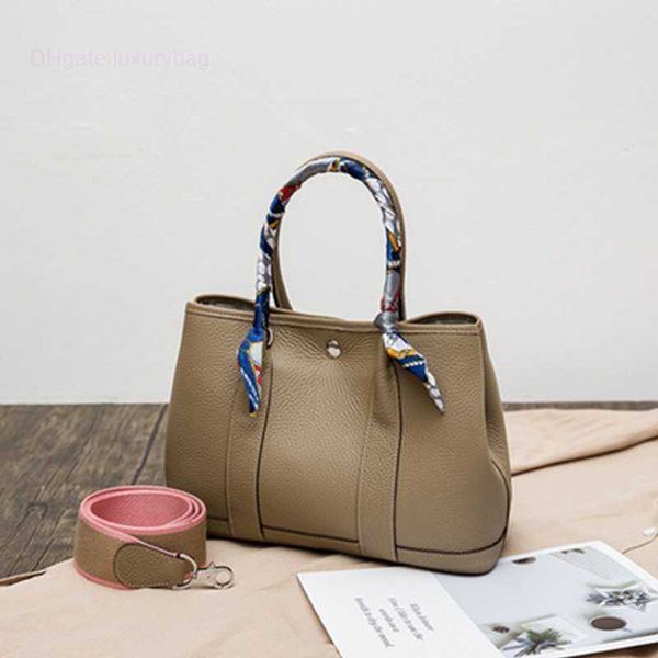 designer herbag garden party evening bag 2023 new fashion leather garden women's large capacity bucket one shoulder portable tote brida
designer herbag garden party evening bag 2023 new fashion leather garden women's large capacity bucket one shoulder portable tote brida
