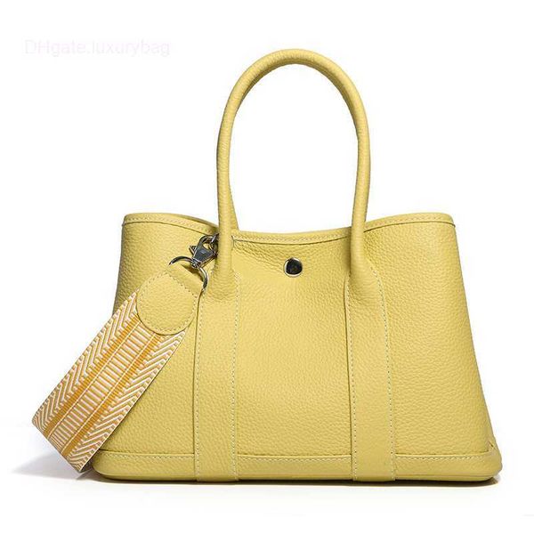 designer herbag garden party evening garden baotou cowhide lizhi pattern women's bag casual one color contrast wide shoulder belt handb
designer herbag garden party evening garden baotou cowhide lizhi pattern women's bag casual one color contrast wide shoulder belt handb