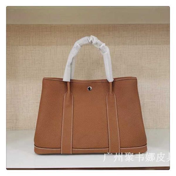 designer herbag garden party evening high end garden layer cowhide leather portable women's bucket large capacity shopping mother bag 5
designer herbag garden party evening high end garden layer cowhide leather portable women's bucket large capacity shopping mother bag 5
