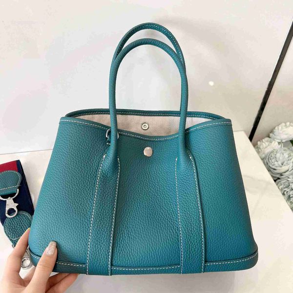 designer herbag garden party evening lychee grain layer cow leather single shoulder messenger with large capacity portable versatile women&#
designer herbag garden party evening lychee grain layer cow leather single shoulder messenger with large capacity portable versatile women&#
