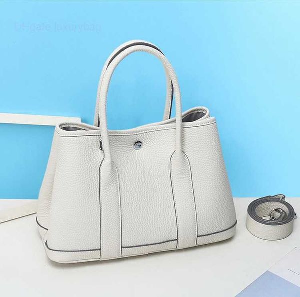 designer herbag garden party evening 2023 new litchi pattern layer cow hand women's h soft leather garden messenger bag 50xg
designer herbag garden party evening 2023 new litchi pattern layer cow hand women's h soft leather garden messenger bag 50xg