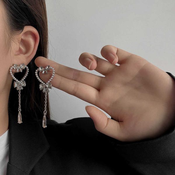 charm 2022 new korean version pearl heart bow tassel earrings women's simple silver color stud earrings party jewelry beautiful gifts a, Golden
charm 2022 new korean version pearl heart bow tassel earrings women's simple silver color stud earrings party jewelry beautiful gifts a, Golden