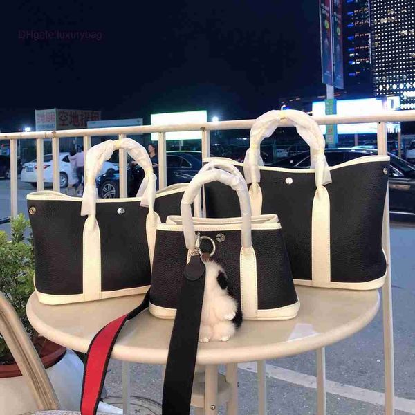 designer herbag garden party evening 2023 new layer cowhide litchi grain 25cm 30cm 36cm garden leather hand versatile messenger bag 4lom
designer herbag garden party evening 2023 new layer cowhide litchi grain 25cm 30cm 36cm garden leather hand versatile messenger bag 4lom