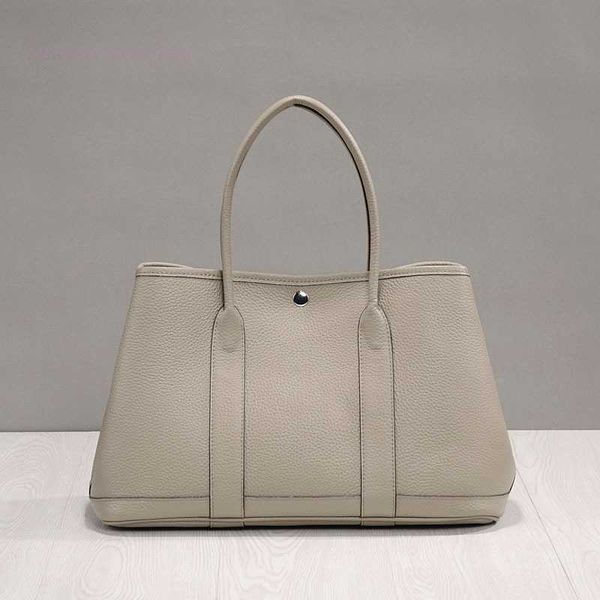 designer herbag garden party evening korean version of simple 2023 lychee head layer cow portable casual leather shoulder for women garden b
designer herbag garden party evening korean version of simple 2023 lychee head layer cow portable casual leather shoulder for women garden b