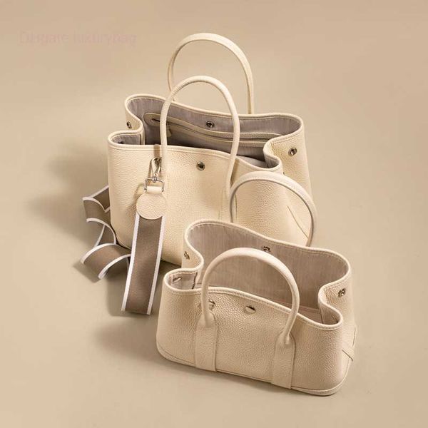 garden party bag totes 7a genuine canvas splicing designer 2023 fashion leather women's large capacity shoulder bridalqq with
garden party bag totes 7a genuine canvas splicing designer 2023 fashion leather women's large capacity shoulder bridalqq with