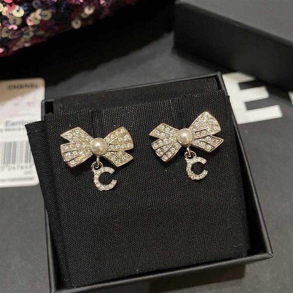 2022 charm drop earring knot shape in 18k gold plated and nature shell beads words design for women engagement have bo344b, Golden
2022 charm drop earring knot shape in 18k gold plated and nature shell beads words design for women engagement have bo344b, Golden