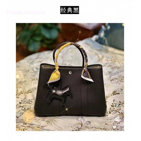 designer herbag garden party evening leather women's one shoulder simple and versatile large capacity shopping commuter portable tote b
designer herbag garden party evening leather women's one shoulder simple and versatile large capacity shopping commuter portable tote b