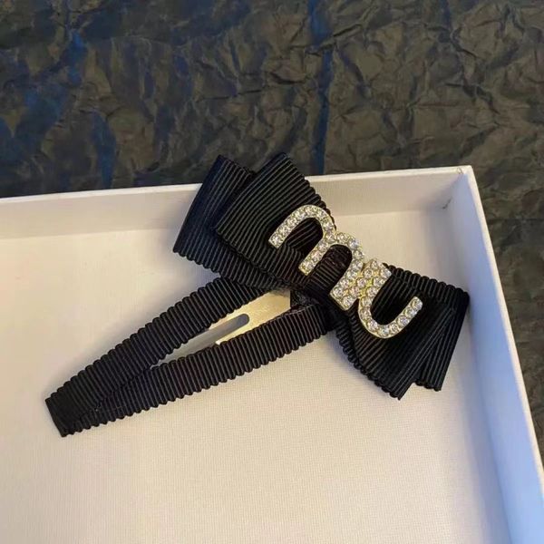 miu women's black bow tie hairpin korean version temperament letter hairpin ribbon metal brushed clip edge clip, Silver
miu women's black bow tie hairpin korean version temperament letter hairpin ribbon metal brushed clip edge clip, Silver