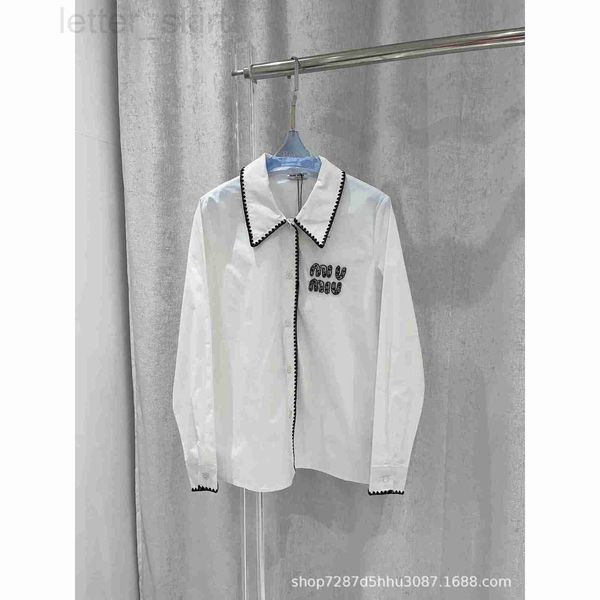 women's polos designer 23 spring/summer new hand hook edge contrast decorative stapled diamond letter long sleeve shirt british ballet, White
women's polos designer 23 spring/summer new hand hook edge contrast decorative stapled diamond letter long sleeve shirt british ballet, White