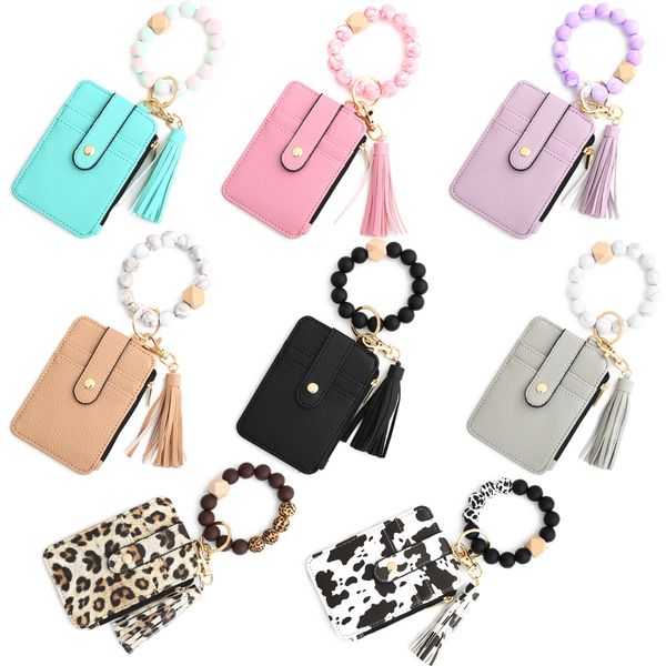 Wallet Keychain Key Rings Silicone Bracelet Leather ID Bag Wooden Bead Bracelet Folded Card Holder
Wallet Keychain Key Rings Silicone Bracelet Leather ID Bag Wooden Bead Bracelet Folded Card Holder